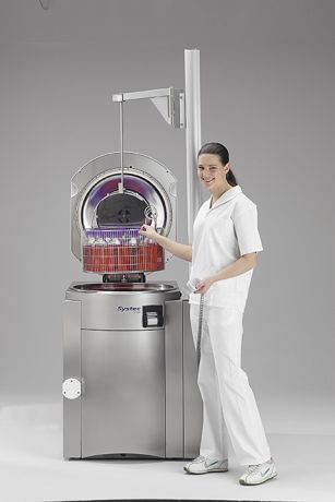 Basket lift for autoclaves