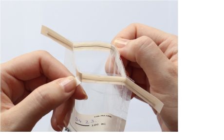 Using the side opening tabs