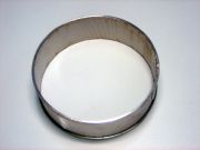 Erősített peremű körszita ZM 300-ba, trapézoid 0,12 mm lyukakkal, rozsdamentes acél